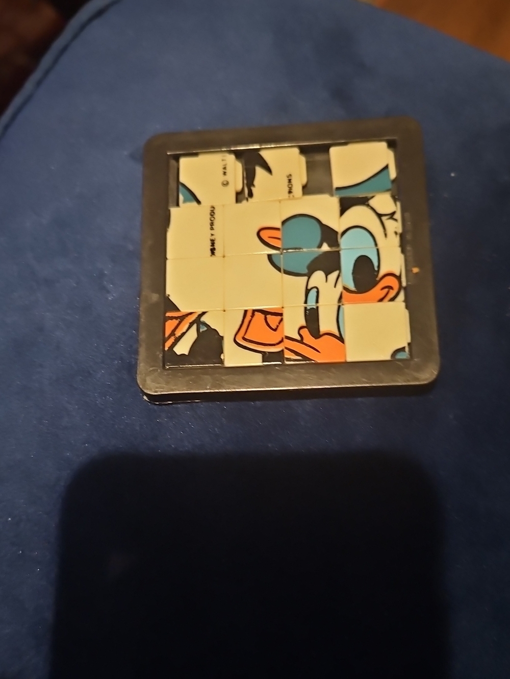 Donald Duck Sliding Puzzle - Blue/White Cartoon Puzzle Game